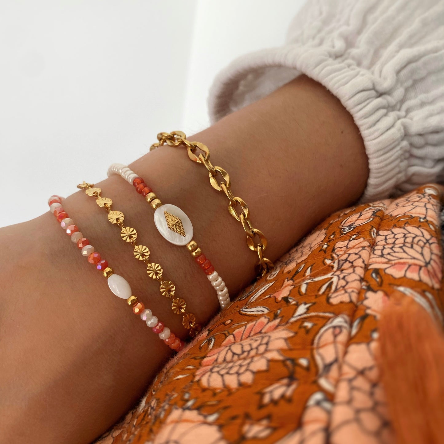 Bijoux tendances fait main dans les tons orangés et doré